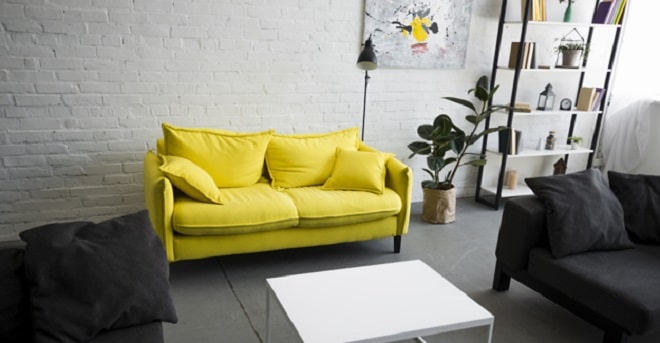 living room with yellow couch